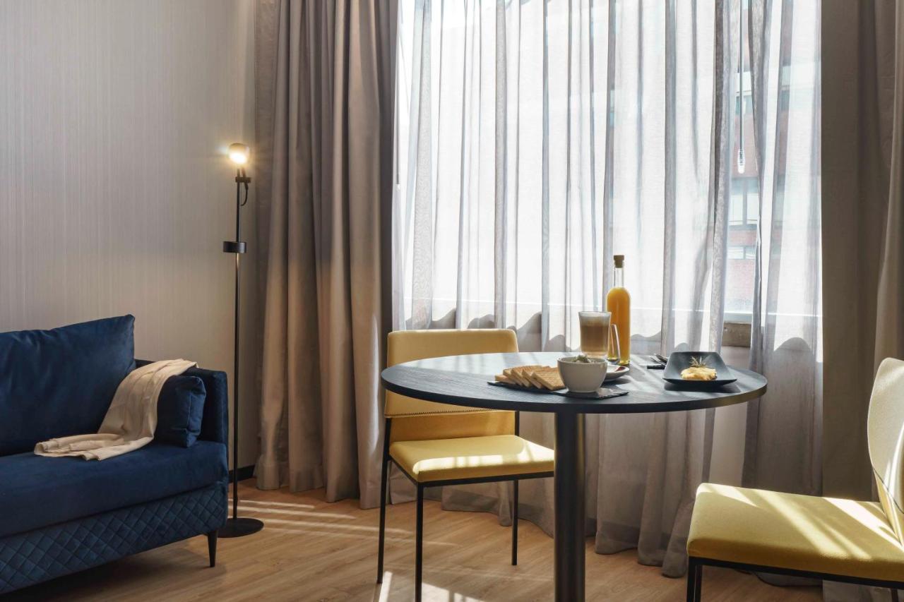 Отель Pullman Santiago El Bosque Экстерьер фото A room at the hotel