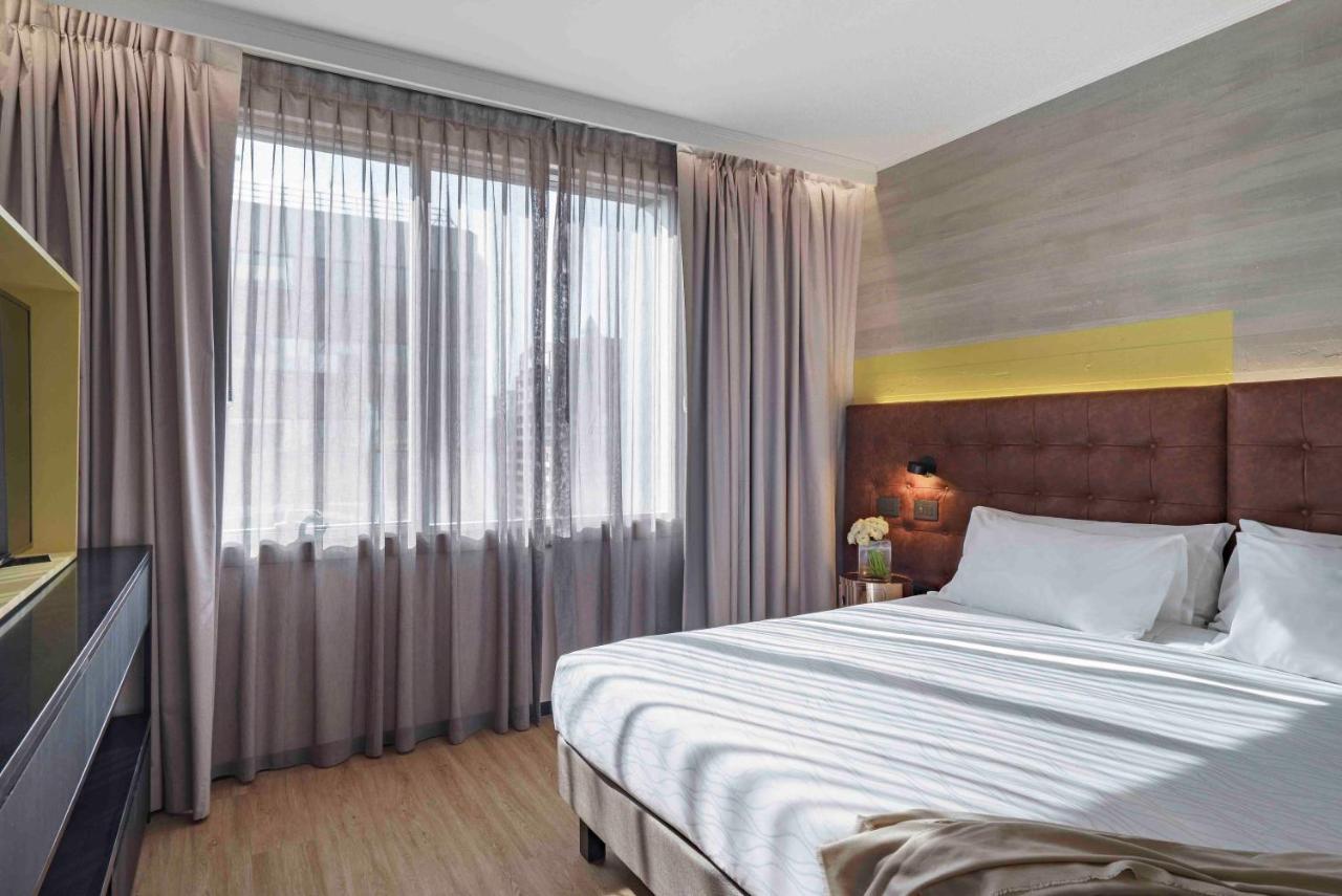 Отель Pullman Santiago El Bosque Экстерьер фото